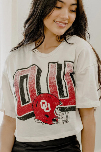 Livy Lu: Sooners Helmet Fade Cropped Tee in Off White - J. Cole ShoesLIVY LULivy Lu: Sooners Helmet Fade Cropped Tee in Off White