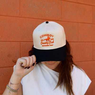 Madley: "Cowboy - est 1998 Country Club Member Only" Hat in Orange, Tan & Black - J. Cole ShoesmadleyMadley: "Cowboy - est 1998 Country Club Member Only" Hat in Orange, Tan & Black